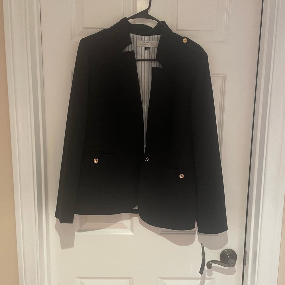Tahari Arthur S. Levine 2 piece garment, blazer and pants. Size 10. Color black